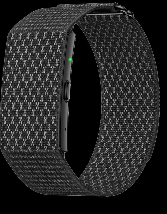 Kira Band in Graphite: black woven nylon loop with a black module, its green status light lit